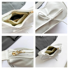 Détails du sac à bandoulière blanc à nœud avec zip doré et poche intérieure zippée