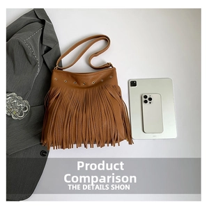 Detailed view of brown litchi pattern leather shoulder bag with long bohemian tassels