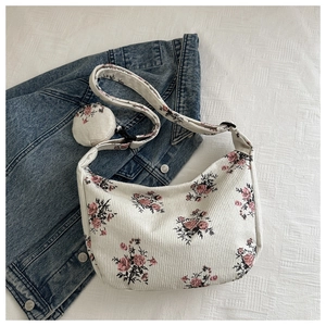 Floral corduroy crossbody bag with matching round coin purse and adjustable strap