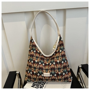 Detail of colorful geometric woven fabric texture on a fashion nylon bucket bag