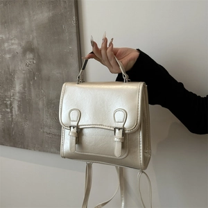 Champagne gold patent leather fashion backpack with dual buckle straps for women