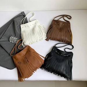 Women PU Leather Tassel Crossbody Bag Large Capacity Hobo Shoulder Bag Metal Eyelets Bohemian Retro