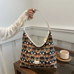 Fashion geometric rhombic pattern tote bag with white leather strap in stylish lifestyle setting