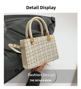 Detail of tweed crossbody bag featuring gold weave texture and woven handle