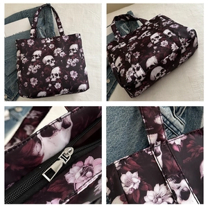Macro details of gothic skull print tote bag with durable zipper and stitching