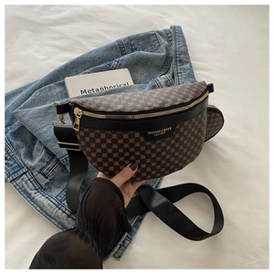 Detail view of crescent waist bag with vintage brown pattern and mini round coin pouch