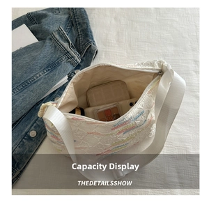 Interior view showing large capacity of the quilted canvas bag for daily essentials