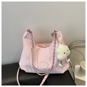Pink pleated hobo bag with silver chain strap and white cloud charm on side