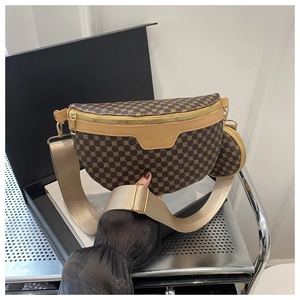 Detail of retro brown monogram waist bag with wide strap and small round pouch