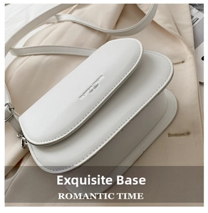 Detail of white saddle bag showing matte PU leather texture and Fashion Trend lettering