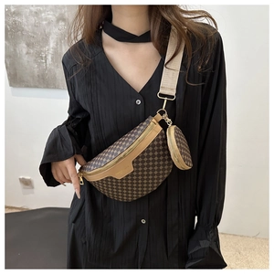 Detail of crossbody waist bag with geometric print and detachable round coin purse on wide strap
