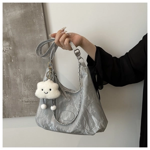 Silver-grey wrinkled shoulder bag with metal chain detail and cloud plush pendant