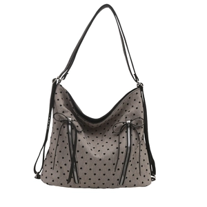 Chic tote bag with black heart prints, vertical zippers, and leather bow decoration