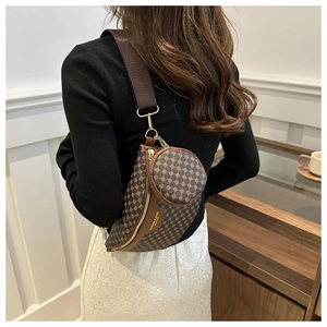 Brown retro pattern fanny pack with round coin purse and wide strap shown on model