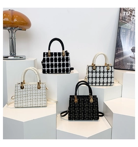 Group display of chic tweed crossbody bags in four elegant patterns with gold hardware