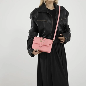 Pink glossy square crossbody bag for women with gold buckle and adjustable strap