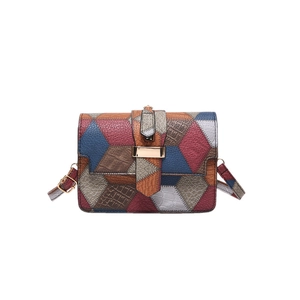 Retro multi-color patchwork crossbody bag with textured leather and gold buckle
