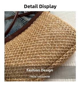 Close-up of handmade woven straw bag with premium dark brown leather strap details