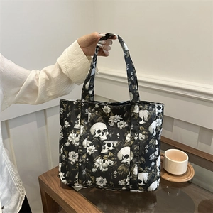 Gothic skull and floral print tote bag for women featuring premium canvas material