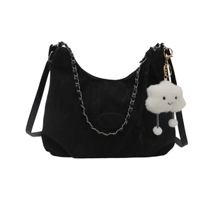 Black crescent tote bag with silver chain and cute white cloud charm in a casual style