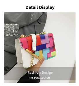 Close-up of the colorful geometric patchwork and premium gold chain on the shoulder bag
