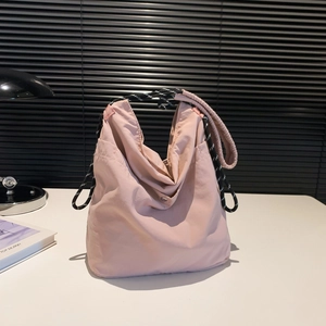 Modern light pink nylon tote bag with rope handle and silver buckle for summer fashion