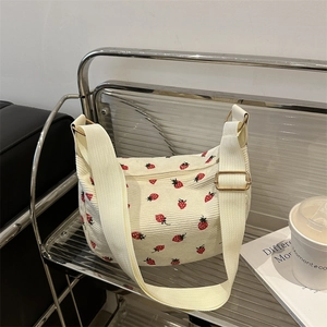Fashionable strawberry print corduroy shoulder bag for women in elegant creamy white