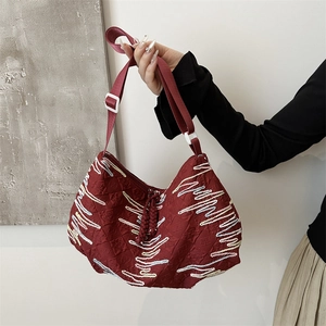 Large capacity Hobo bag in dark red fabric with rhythmic stripe embroidery for women