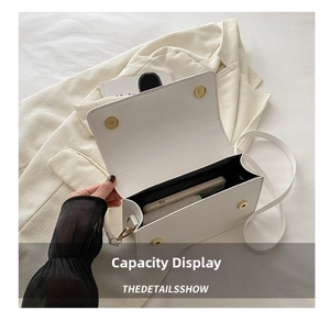 Capacité interne du sac carré en cuir PU blanc montrant le rangement du téléphone et fermoirs