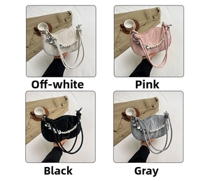 Chic gathered texture handbag detail with elegant pearl chain and heart metal buckle