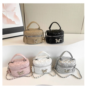 Detailed group view of quilted mini vanity bags with elegant silver butterfly buckles