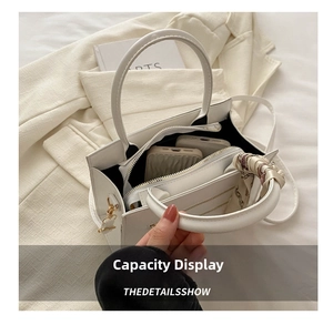 Internal view of a spacious white PU leather tote bag with silk scarf decoration