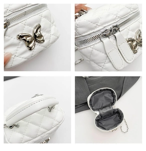 Detail shots of white quilted mini box bag featuring silver butterfly and double zippers