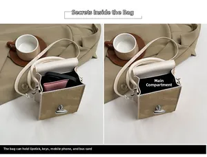 Detailed view of beige suede shoulder bag interior showing capacity for phone and lipstick