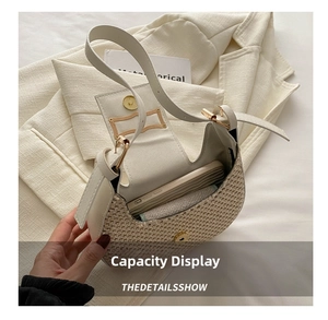Top view of beige straw saddle bag showing interior capacity for phone and essentials