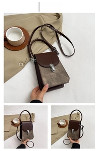 Close-up of coffee brown crossbody bag featuring mixed textures and silver buckle detail