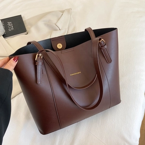 Minimalist large brown PU leather tote bag with gold hardware and shoulder straps