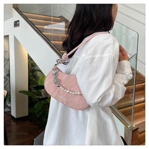 Pink crescent underarm bag featuring jacquard texture and silver heart pearl chain