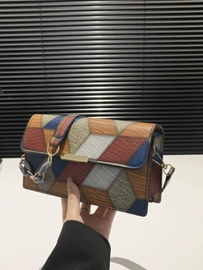 Retro multi-color geometric patchwork leather handbag with gold buckle and resin chain
