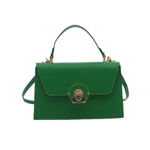 Modern emerald green square crossbody bag with gold round metal buckle and top handle