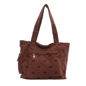 Brown corduroy tote bag with black bow check pattern and functional front zipper pocket