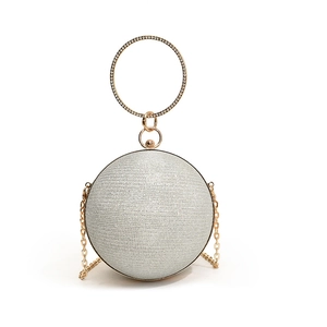 Sparkly silver spherical evening bag with rhinestone ring handle and gold chain strap