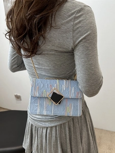 Light blue striped plaid crossbody bag with gold chain strap and square metal lock