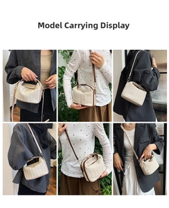 Detail of summer straw crossbody bag with brown leather handles and adjustable straps