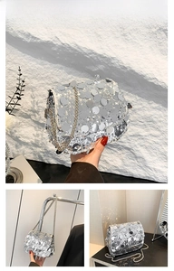 Detail of silver sequin crossbody bag with chain strap and reflective metallic finish
