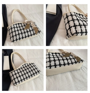 Detail of tweed chain tote bag with color-block base and leopard print silk scarf