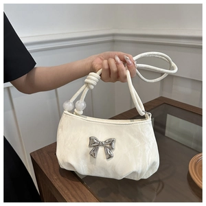 Elegant off-white pleated shoulder bag with silver bow and pearl bead strap details