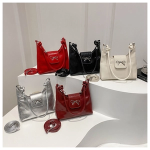 Chic bow bucket bags in multiple colors including red, black, white, silver, and burgundy