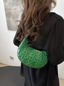Minimalist grass green crescent hobo bag for women with woven texture and gold hardware