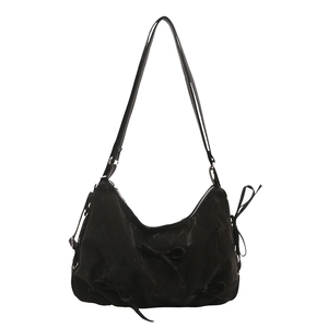 Large black hobo tote bag with stylish ribbon bows and adjustable shoulder strap